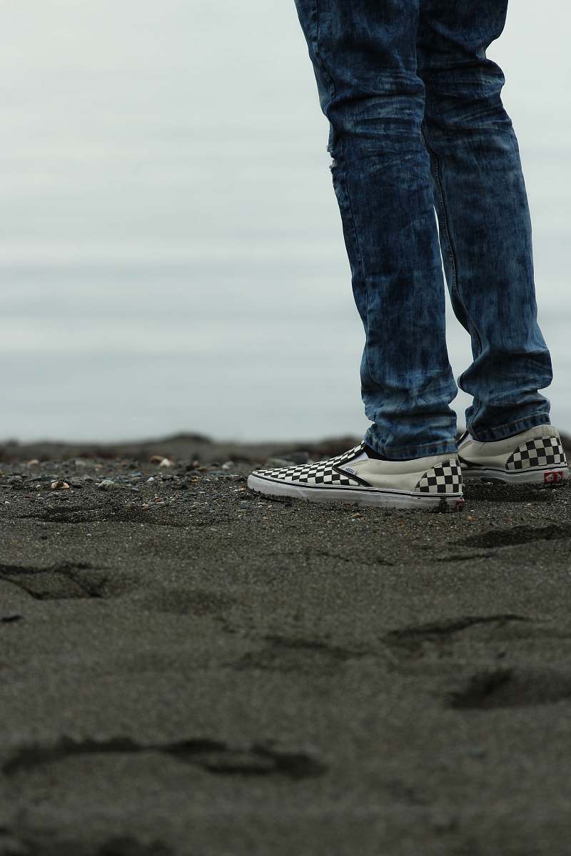 people person standing on gray sands human