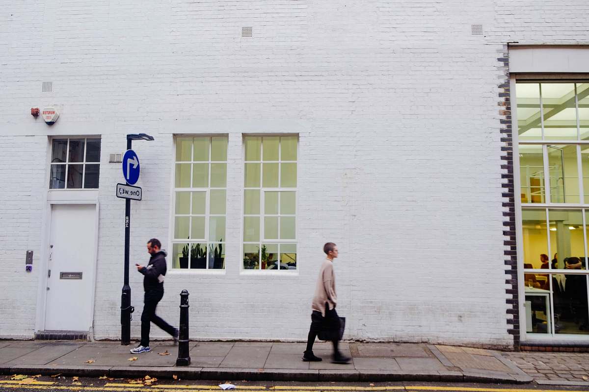 people two person walking on side walk human