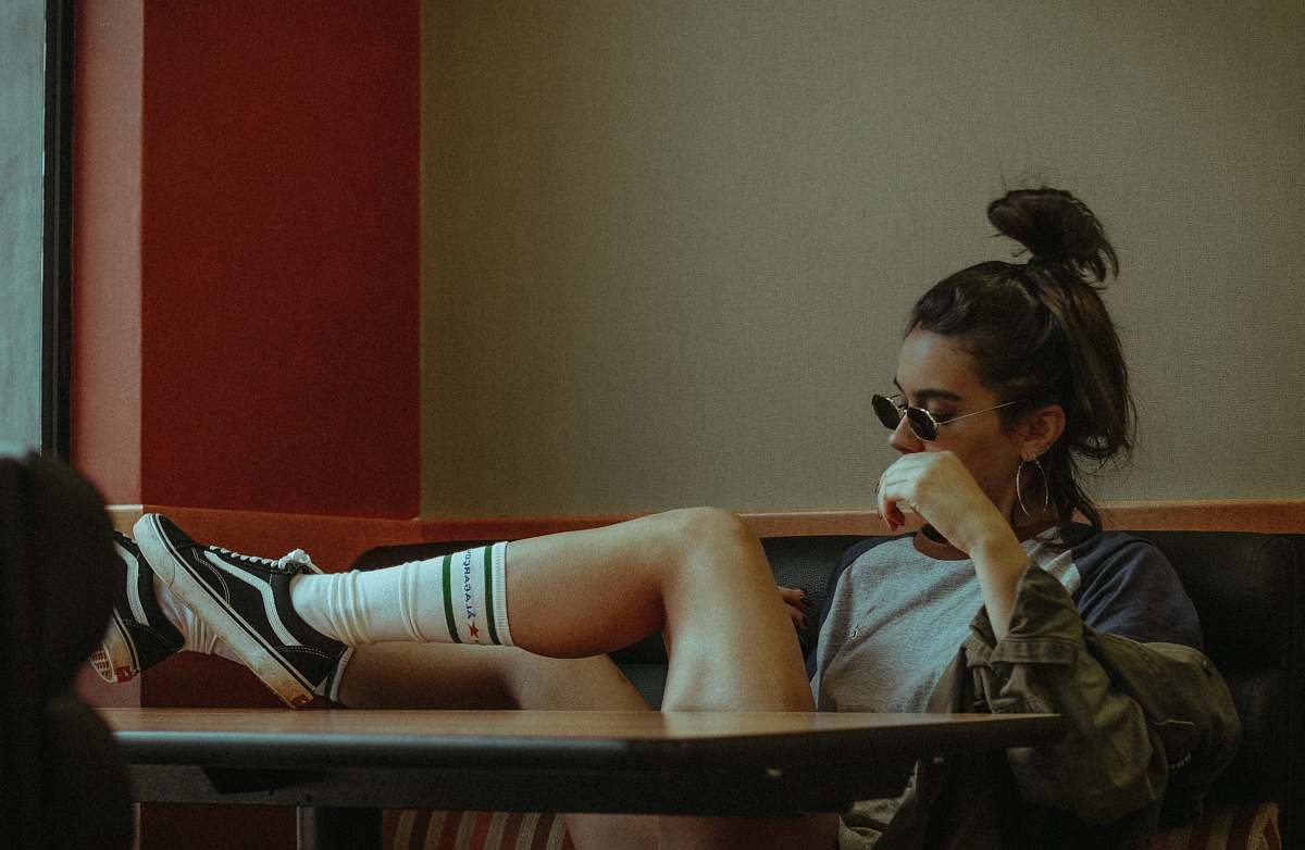 people woman sitting on couch human