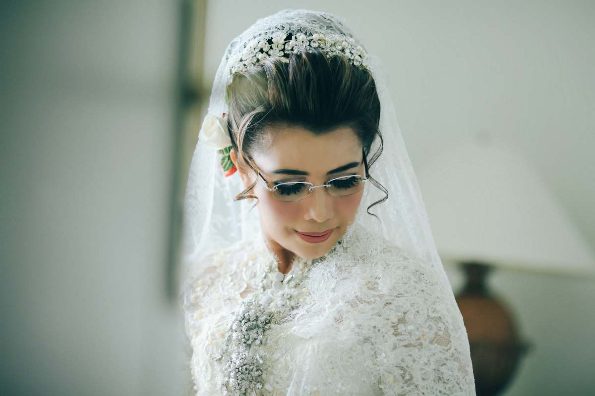 people woman wearing white lace top with veil human