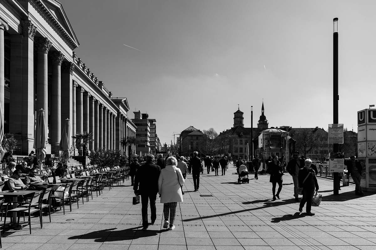 human grayscale photography of group of people on road pedestrian