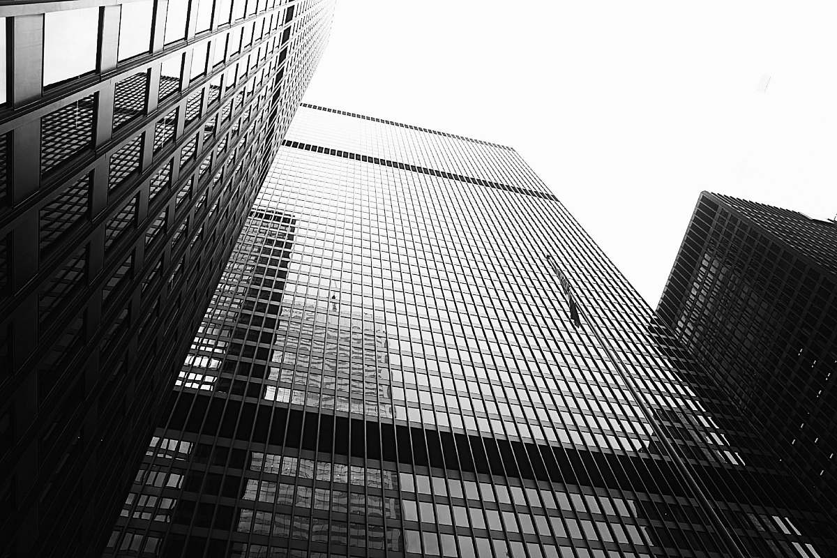 city grayscale photography of high rise building building