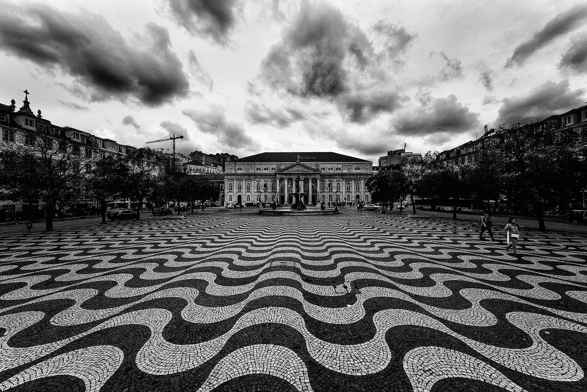 building greyscale photo of building city