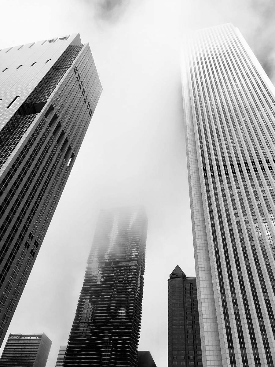urban greyscale photography of buildings building