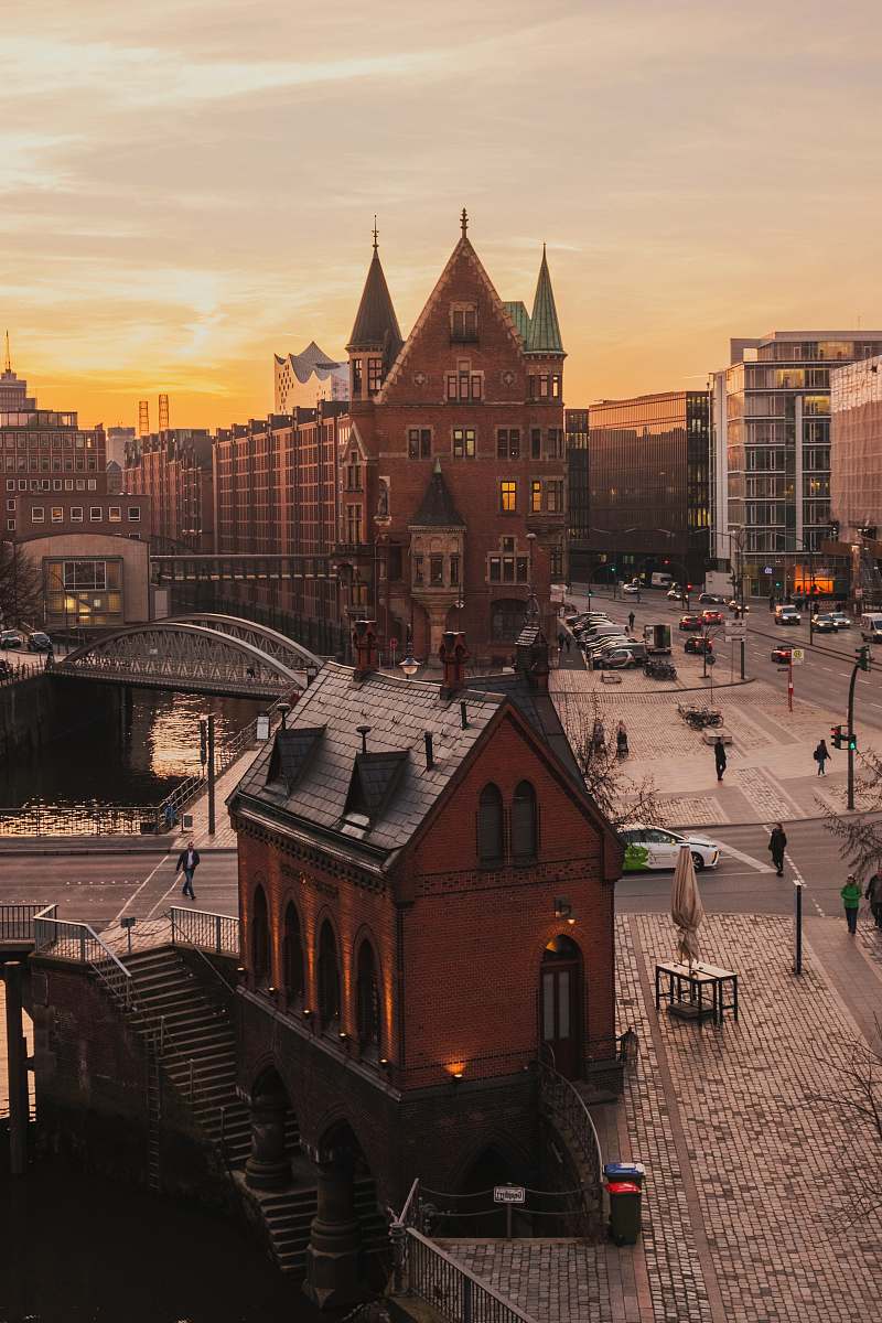 city aerial photography of brown and black house downtown