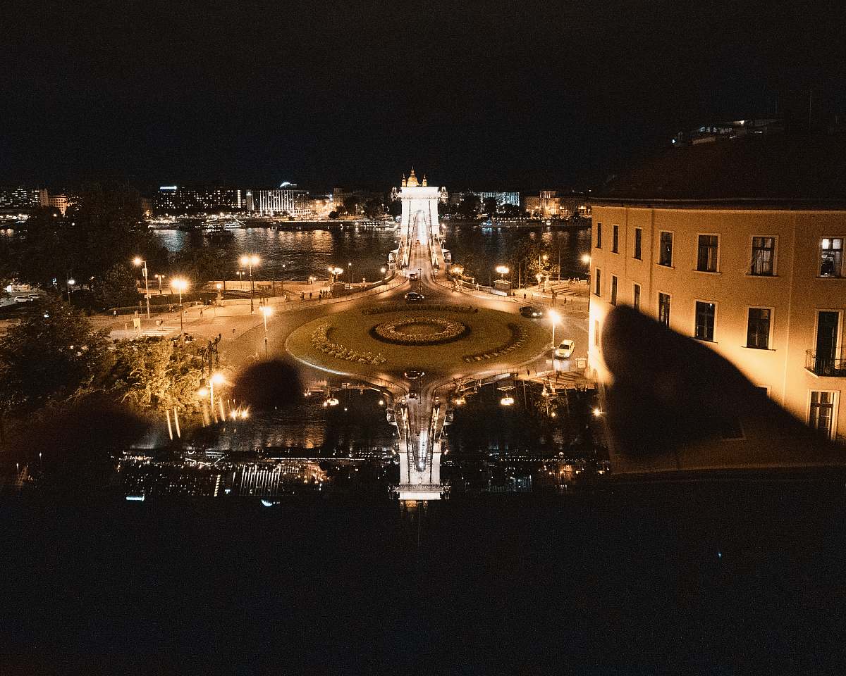city aerial photography of building during nighttime downtown