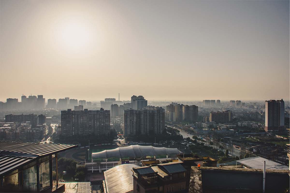 city aerial photography of building under clear blue sky metropolis