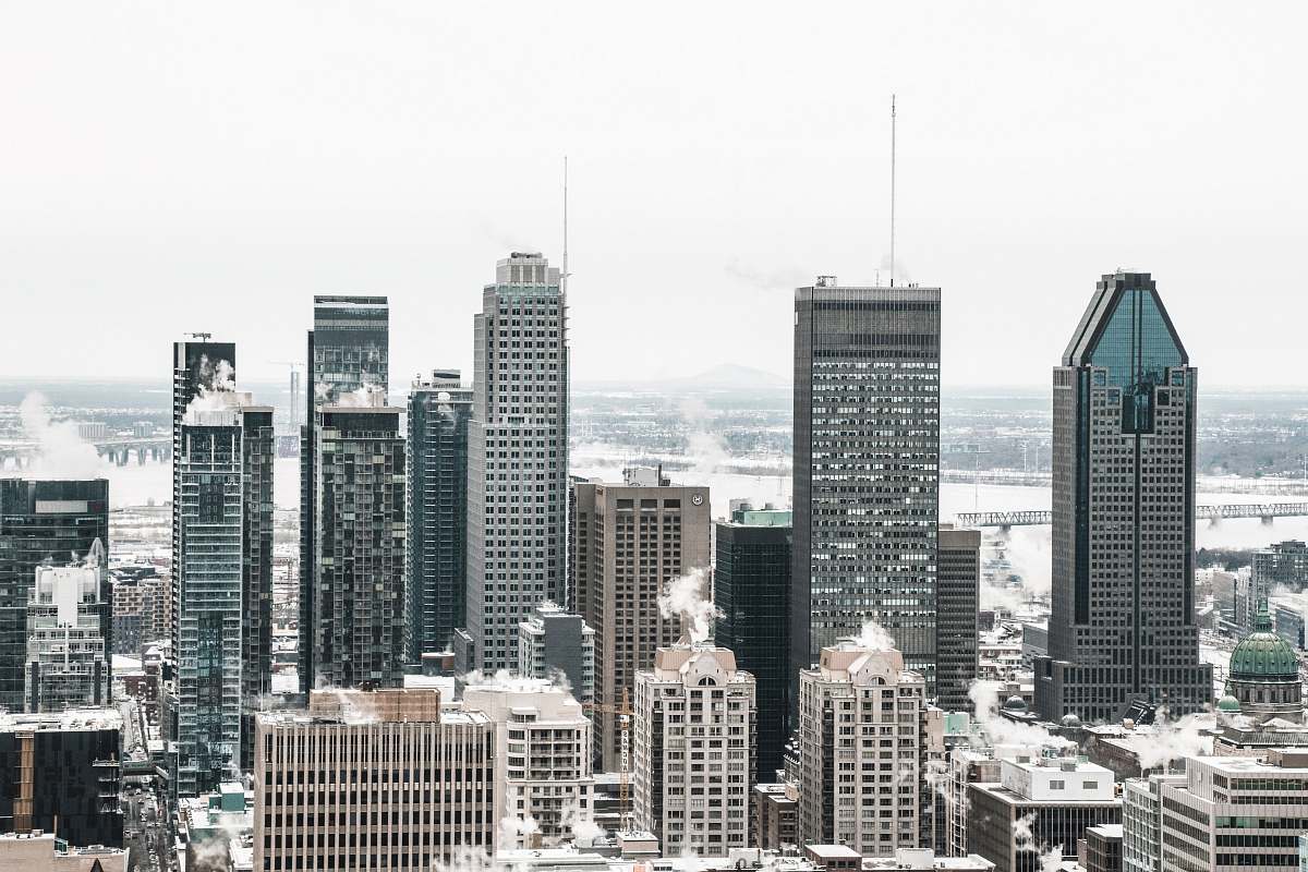 city aerial photography of city buildings during daytime high rise