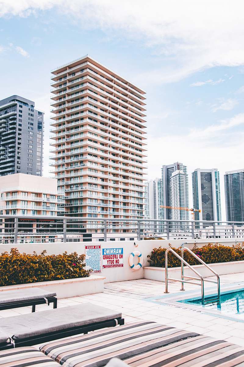 condo architectural photography of white and beige building housing