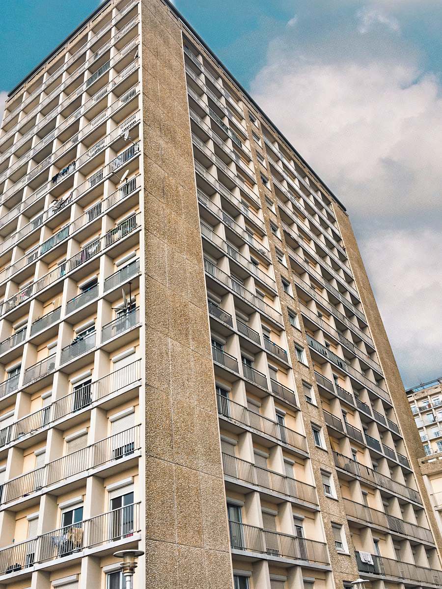 city beige and white painted building high rise