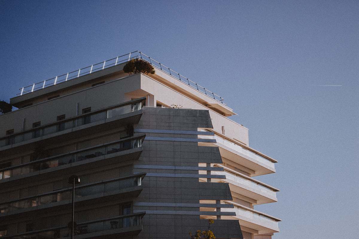 city beige building during day high rise