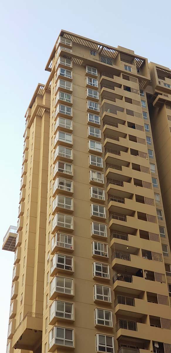 condo beige concrete high-rise building housing