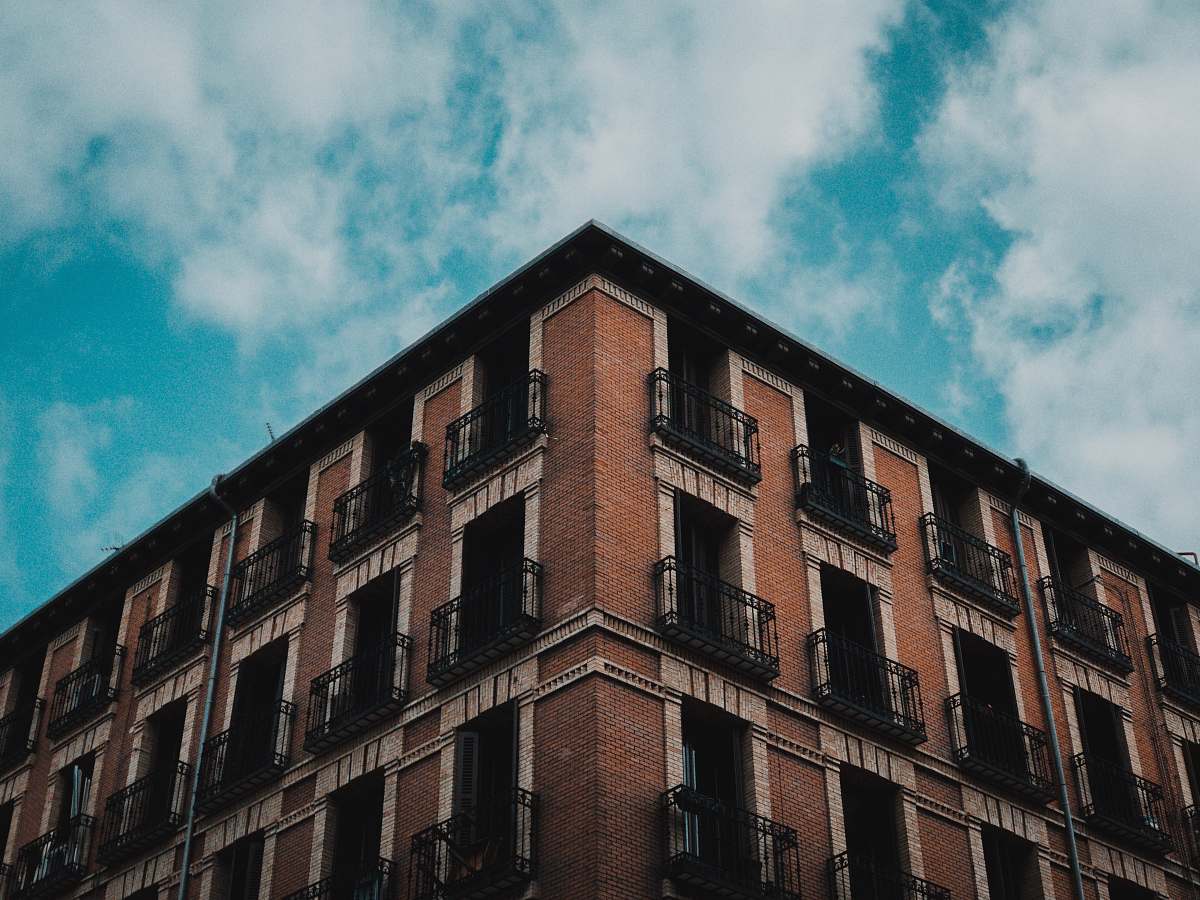 city black and brown concrete building high rise