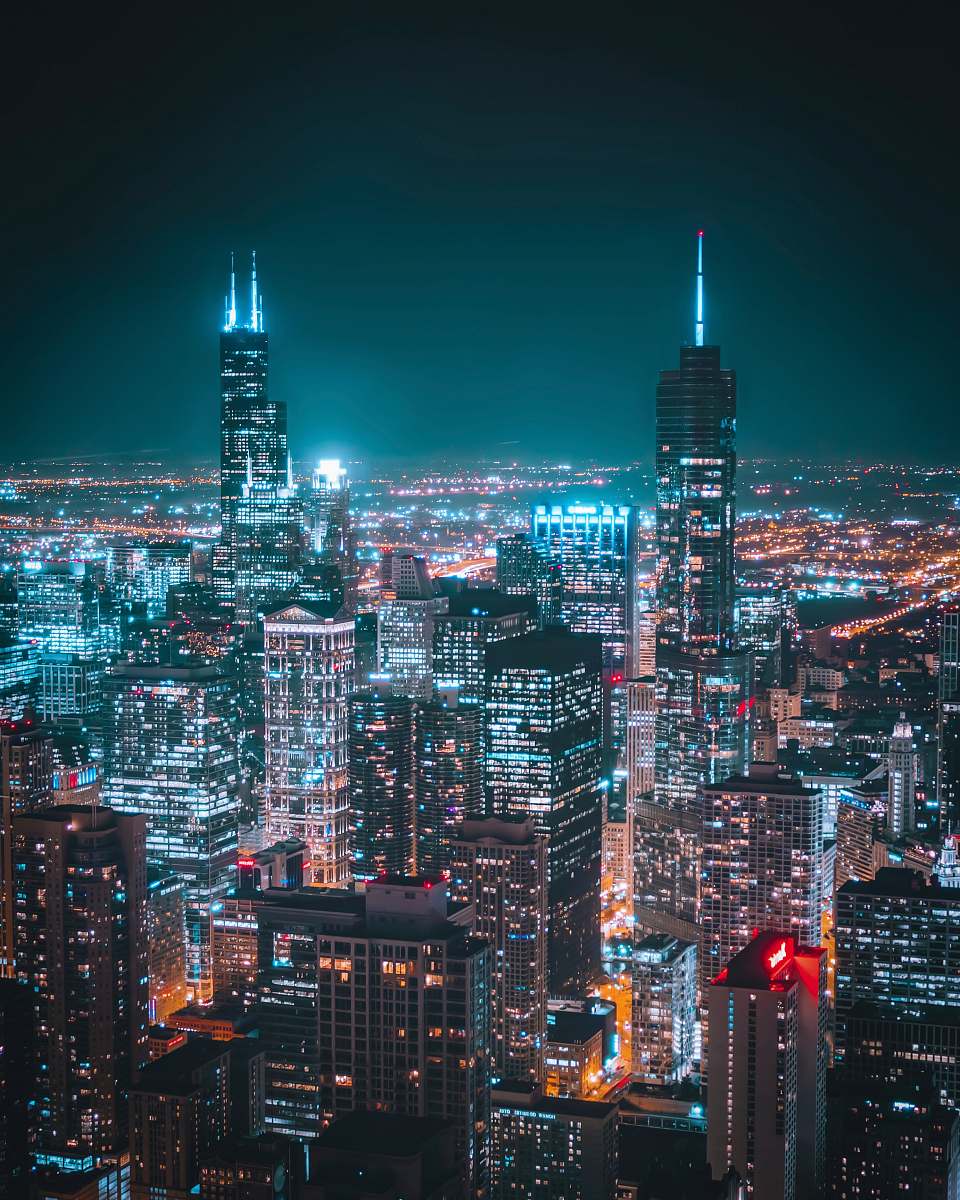 city black lighted high-rise buildings town