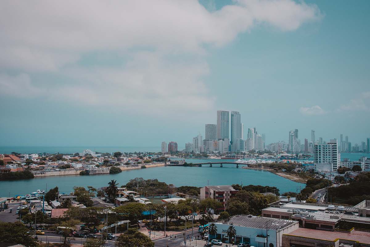 city body of water near buildings metropolis