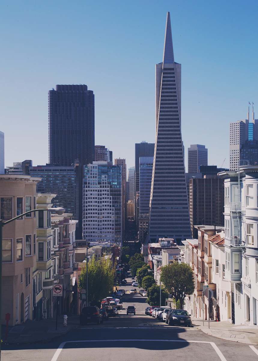 city brown and beige building and road urban