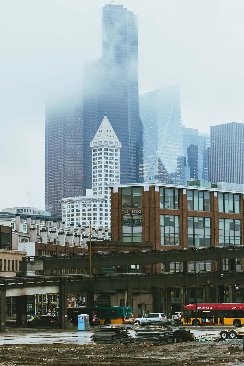 city brown and gray concrete city buildings during daytime high rise
