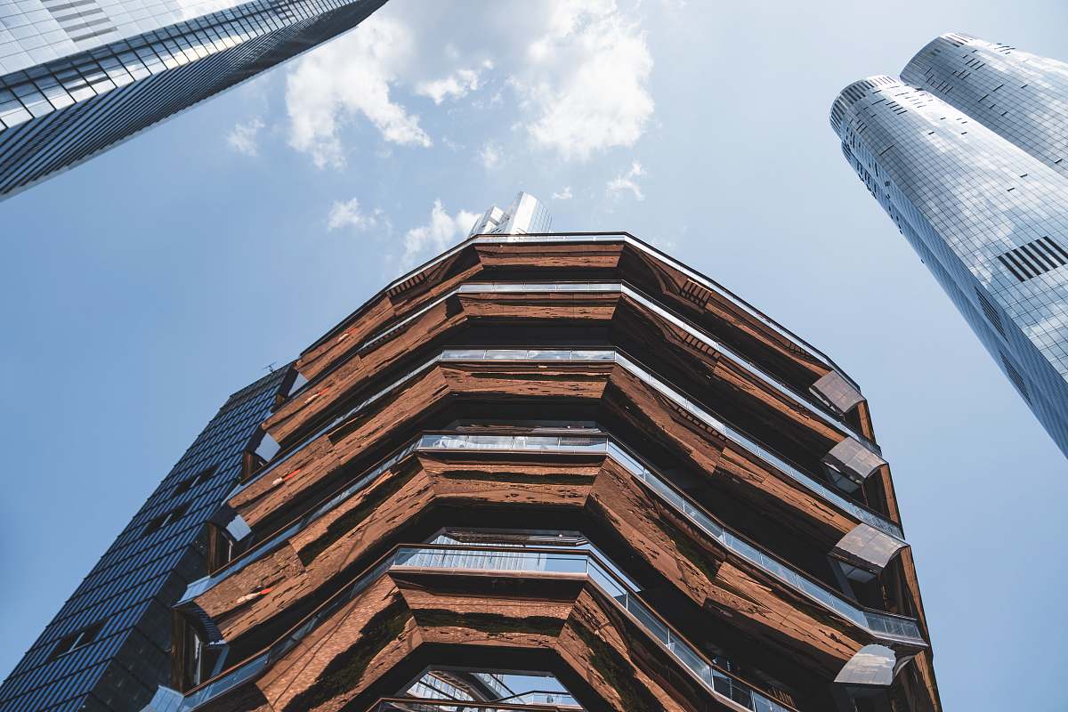 city brown and gray high building at daytime high rise