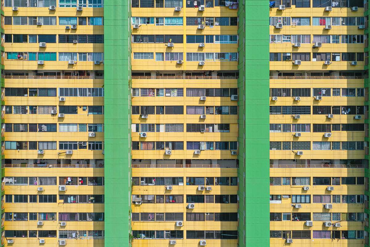 town brown and green concrete building during daytime urban