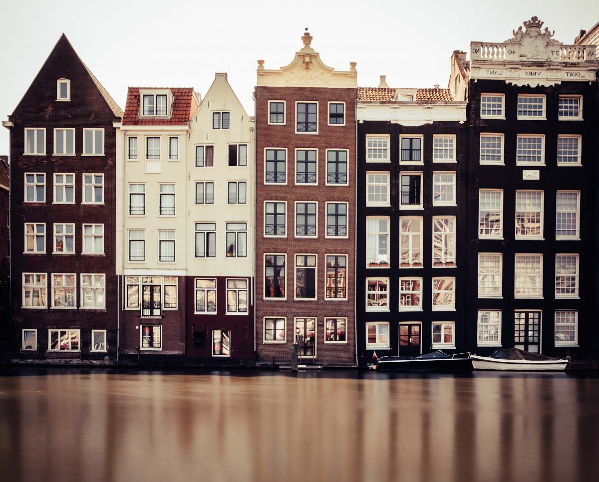 condo brown, black, and white houses housing