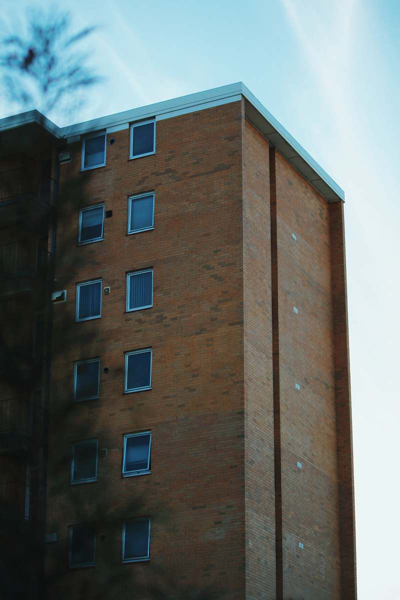 city brown brick building high rise