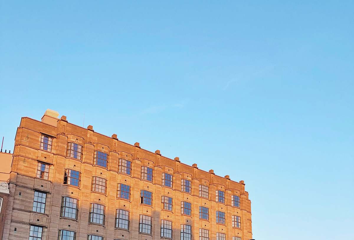 city brown concrete building high rise