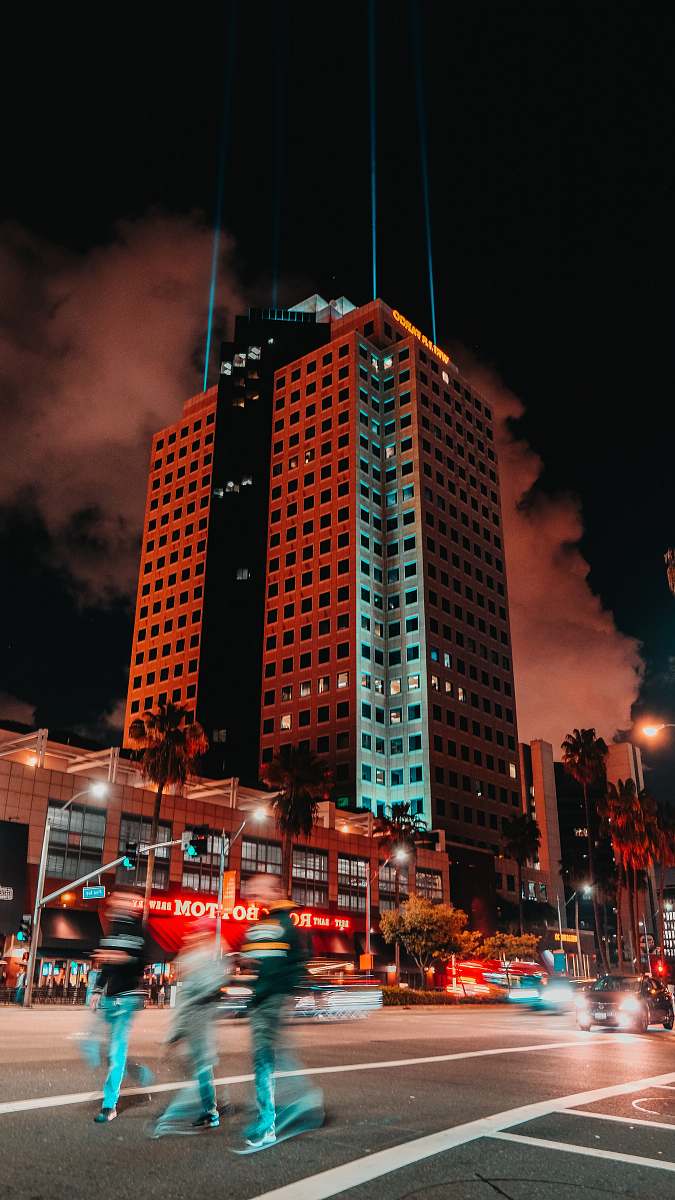 town brown concrete building during nighttime urban