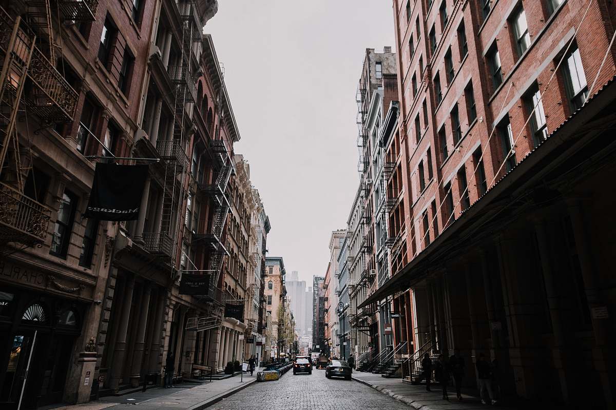 city brown concrete buildings road