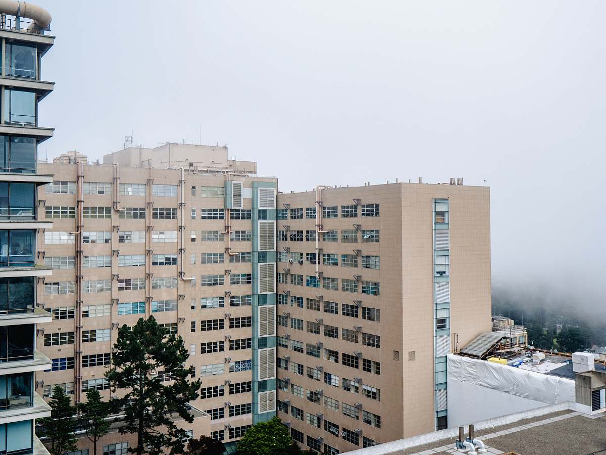 city brown concrete buildings during daytime urban