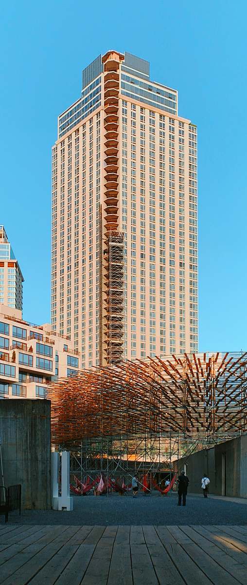 city brown high rise building during daytime high rise
