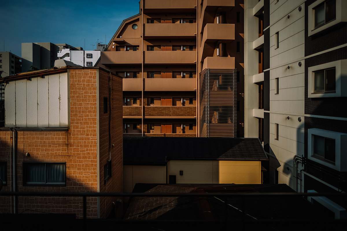 city brown high rise tenement building high rise