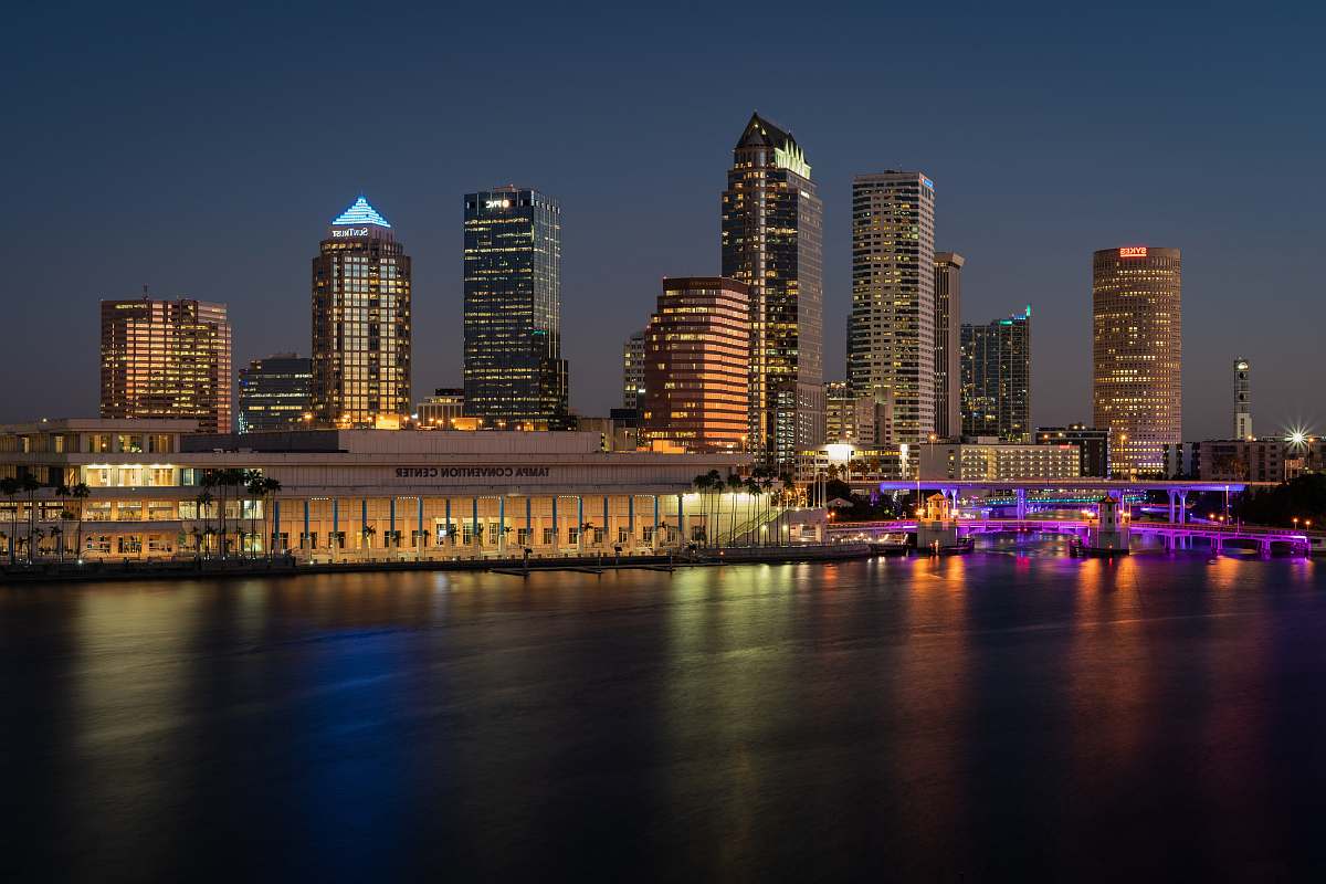 city buildings near body of water town
