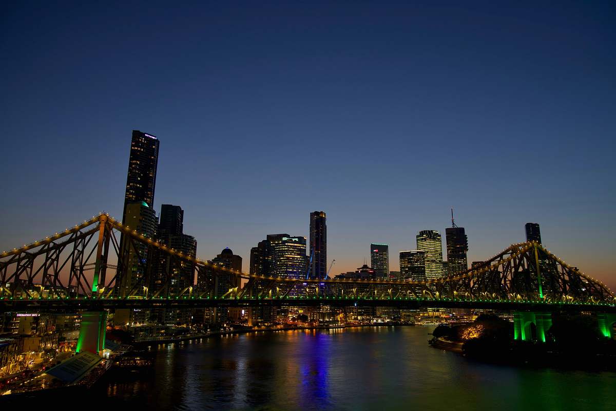 city cable-stayed bridge at night metropolis