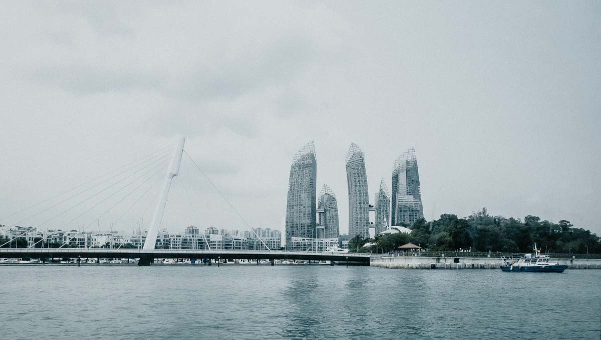 city city buildings under cloudy sky high rise
