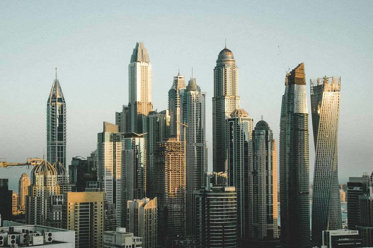city city buildings under sunny sky skyscraper