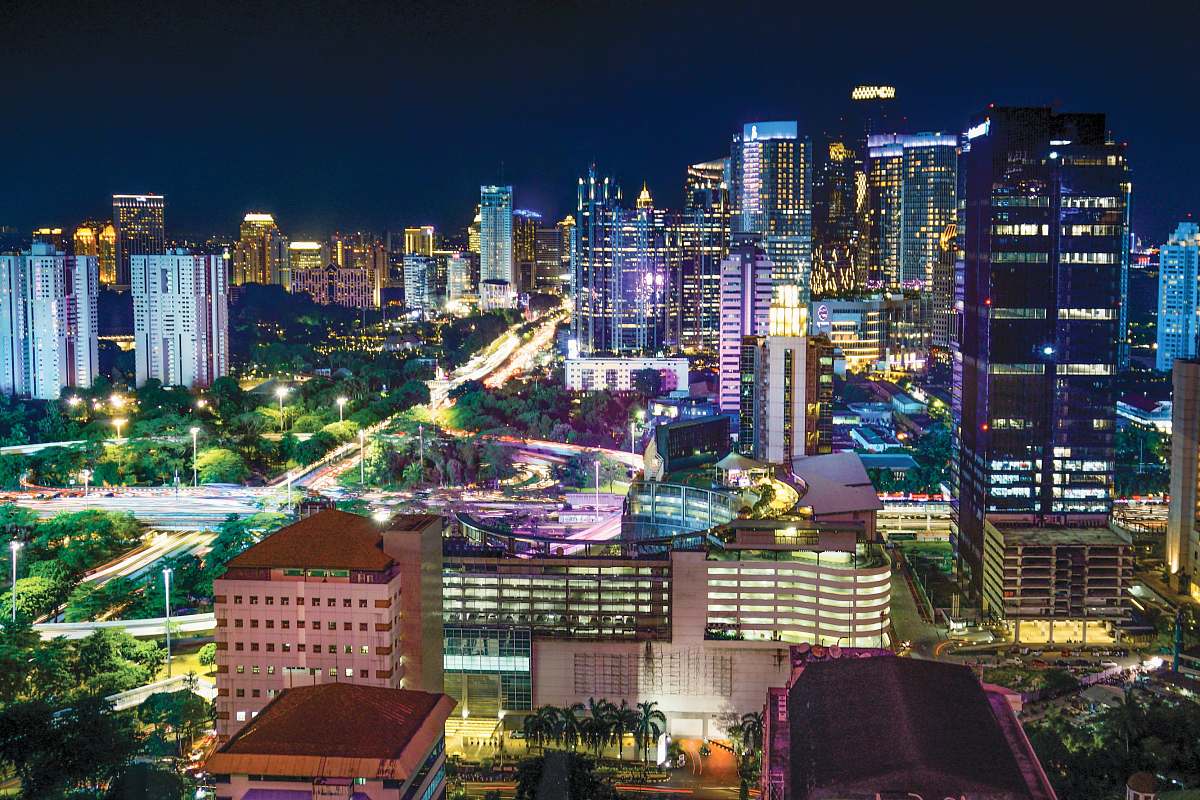 city cityscape with lights turned-on during nighttime urban