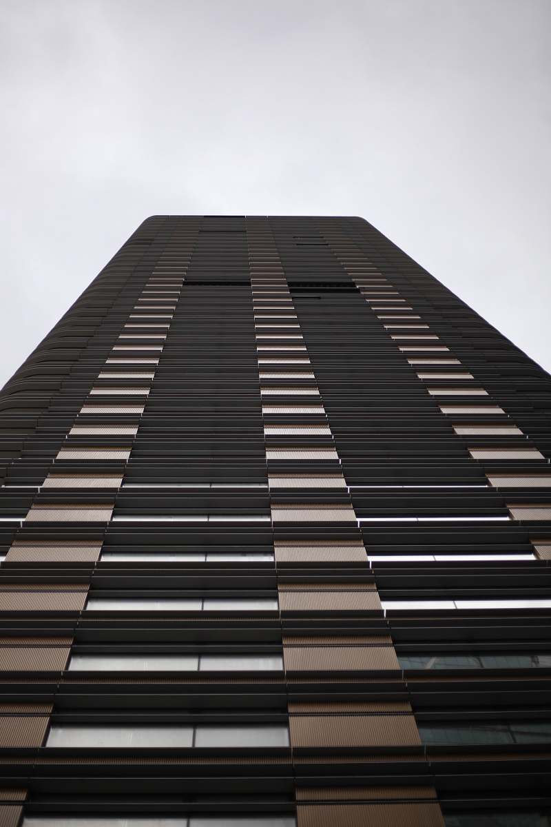 city close-up photography of high-rise building during daytime high rise