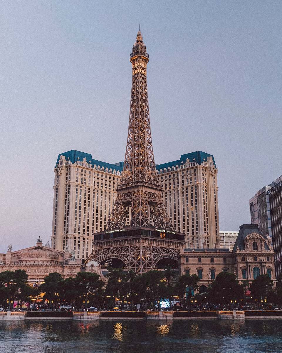 city Eiffel tower near white concrete building downtown