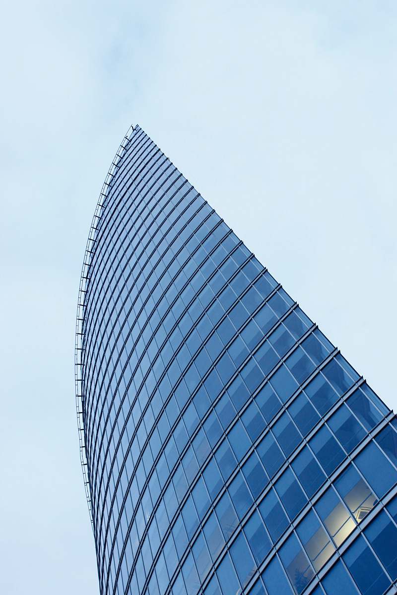 city glass-wall high-rise buildign at daytime high rise