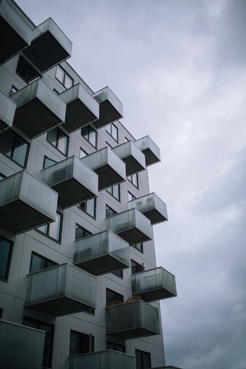 city gray concrete building at daytime urban