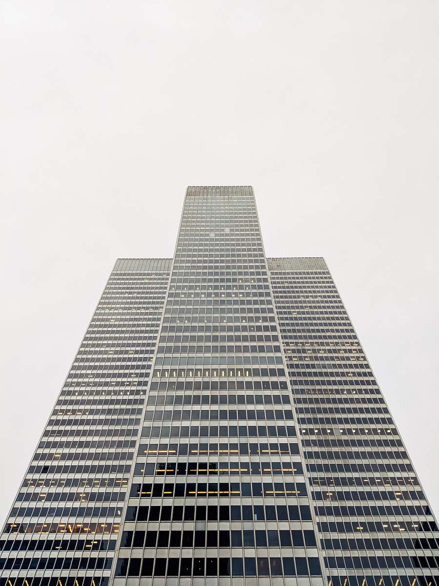 city gray tower building on gray sky architecture
