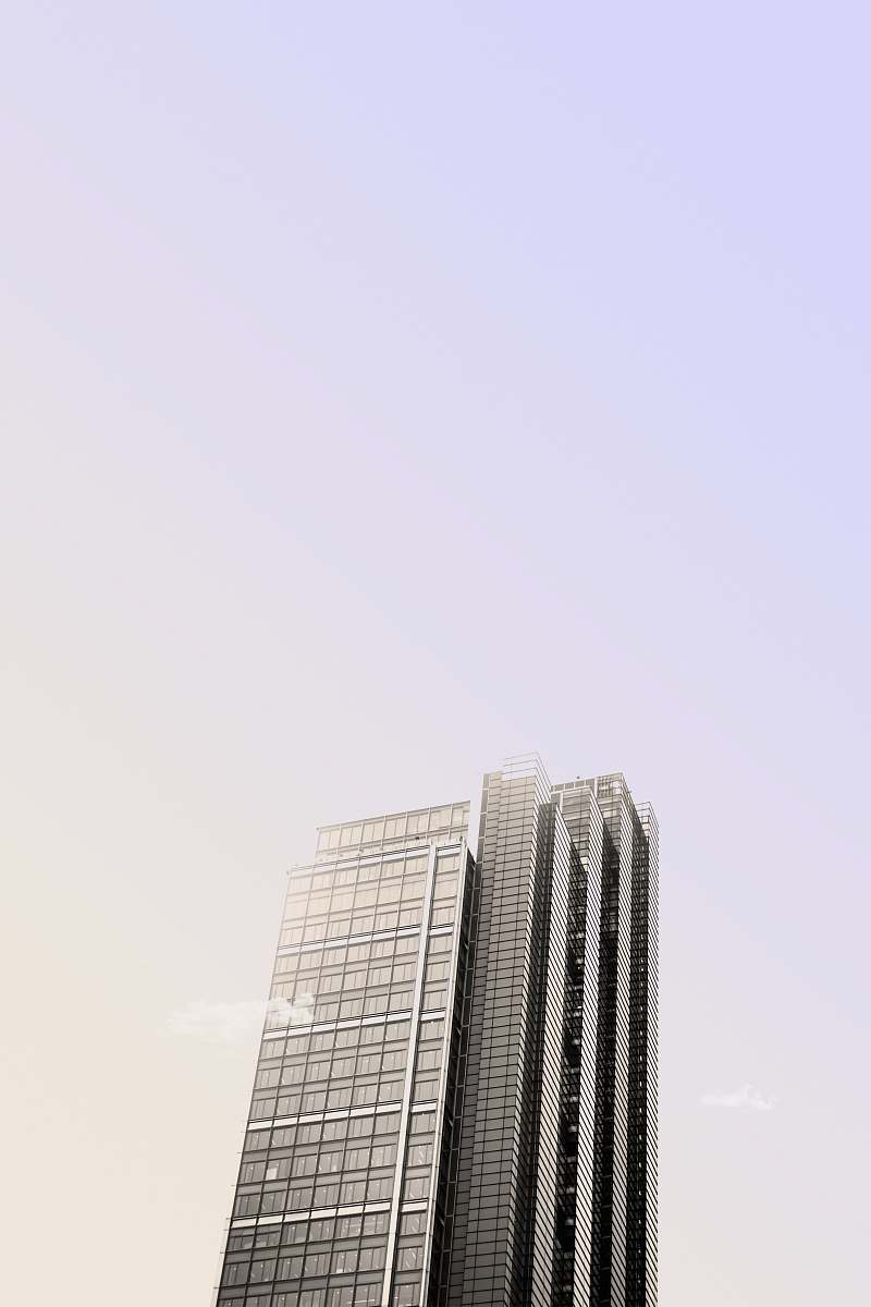 city grayscale photo high rise building urban