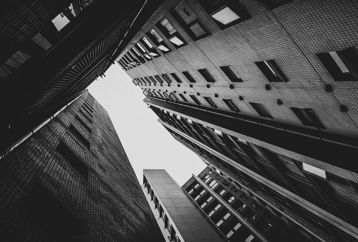 city grayscale photo of building black-and-white