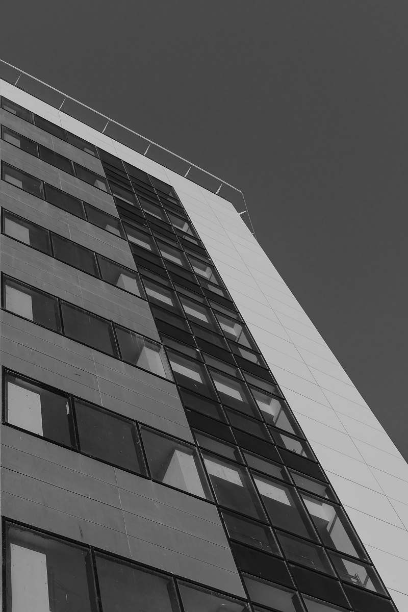 city grayscale photo view of building black-and-white