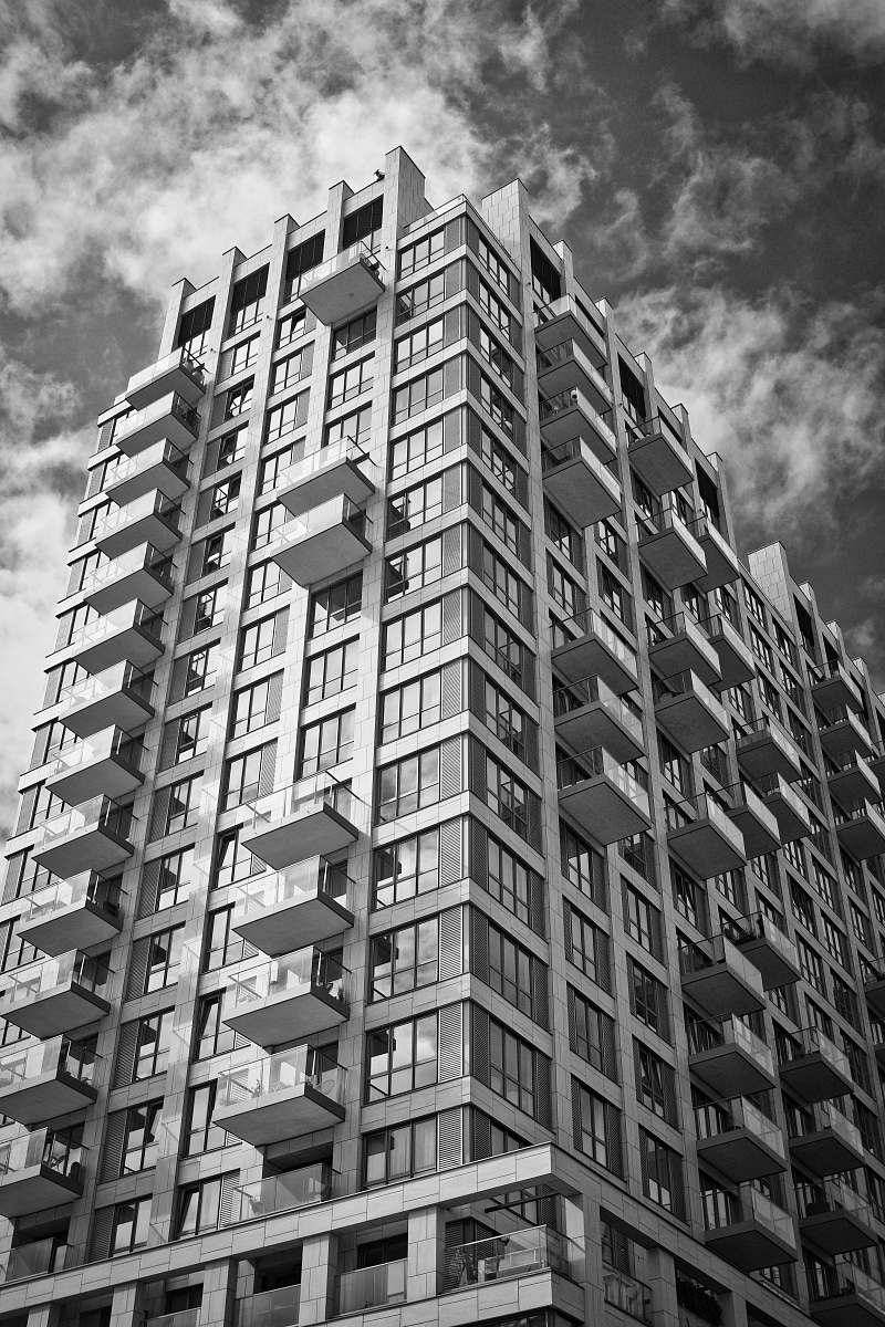 city grayscale photography of high-rise building black-and-white