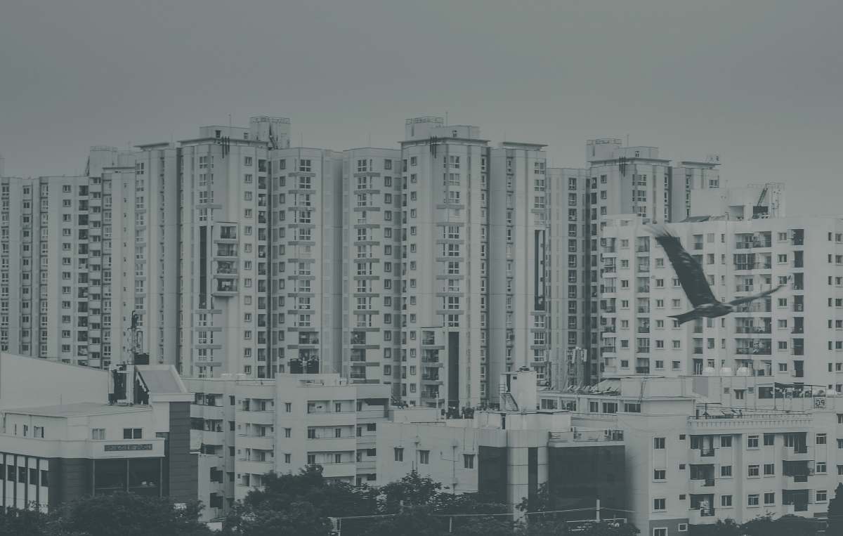 city grayscale photography of skyscraper grey