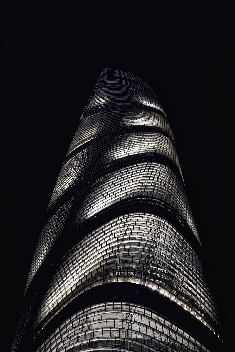 city grayscale photography of tower high rise