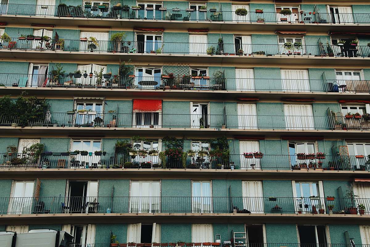 city green and white building high rise