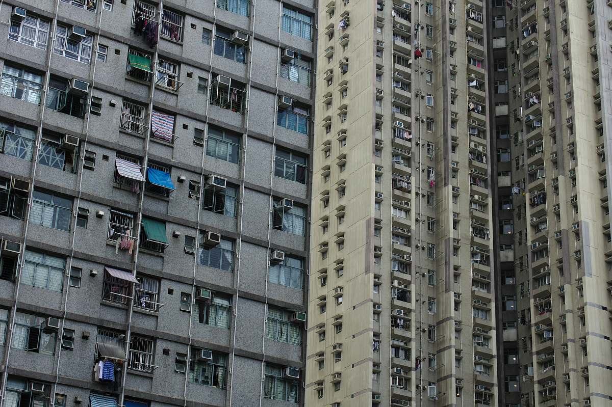 city grey concrete high-rise building high rise