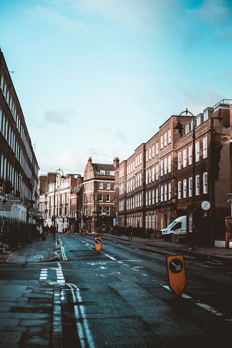 city grey road during daytime road